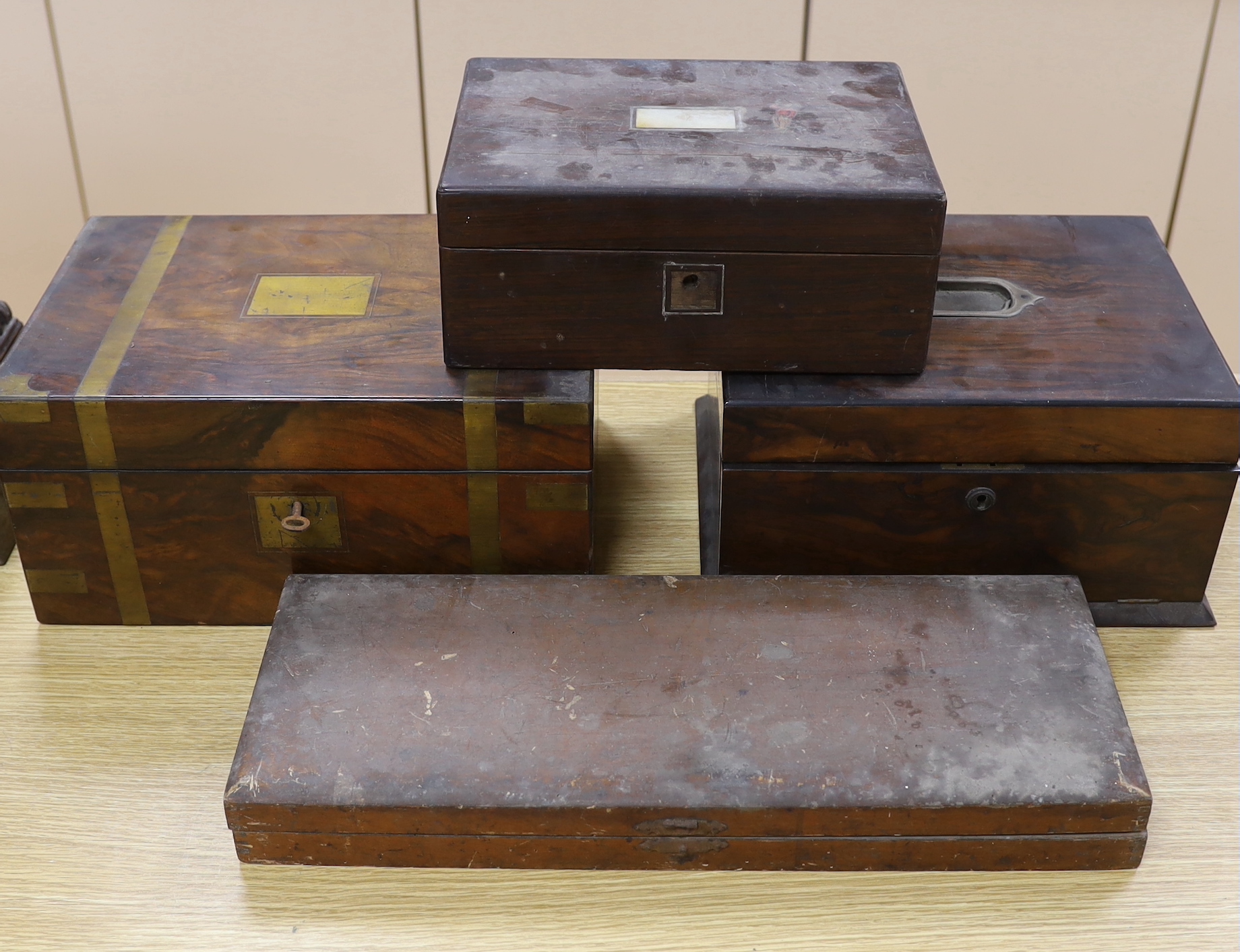 A Victorian brass mounted walnut writing box, work box with fitted interior, rosewood box with mother of pearl inlaid panel together with vintage cased printing blocks, the largest 47.5cm wide